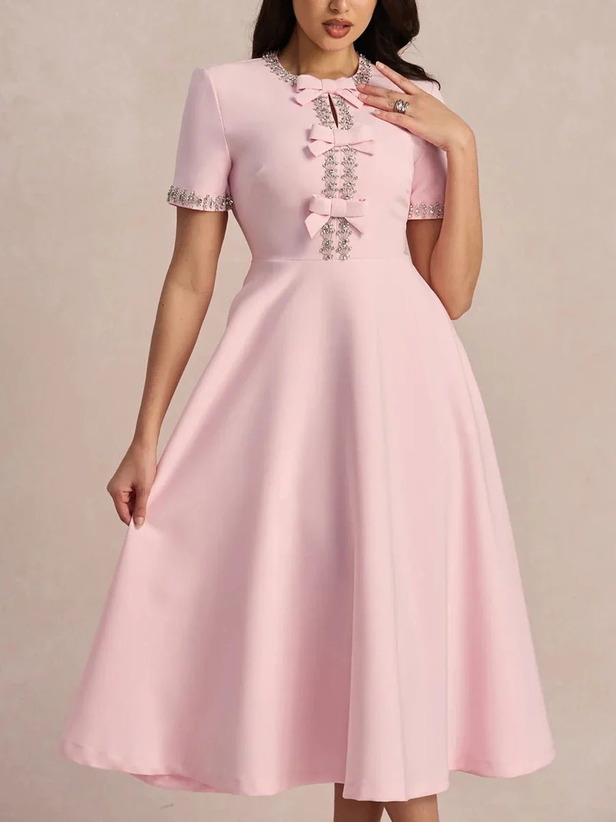 Elegancka sukienka midi z kokardkami i zdobieniem przy dekolcie - vivano - warszawa