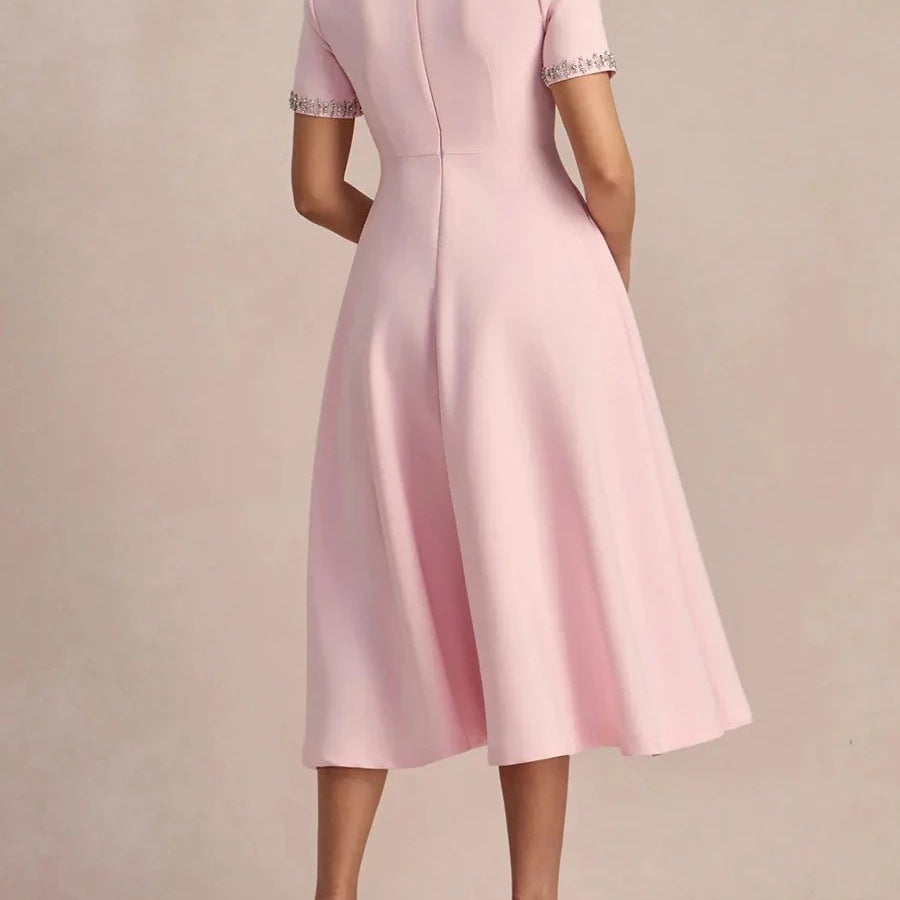 Elegancka sukienka midi z kokardkami i zdobieniem przy dekolcie - vivano - warszawa