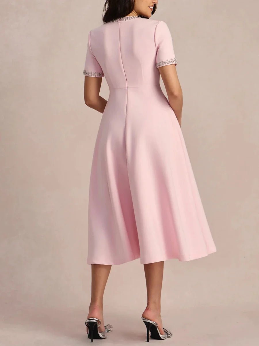 Elegancka sukienka midi z kokardkami i zdobieniem przy dekolcie - vivano - warszawa