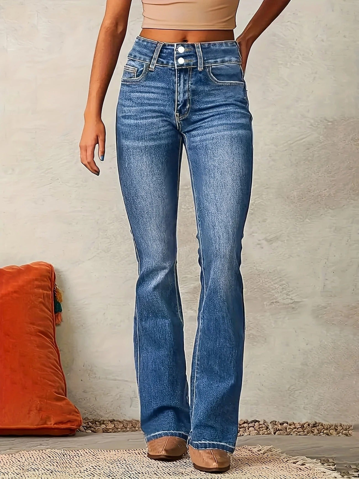 Damskie dżinsowe spodnie dzwony high waist dopasowane niebieskie