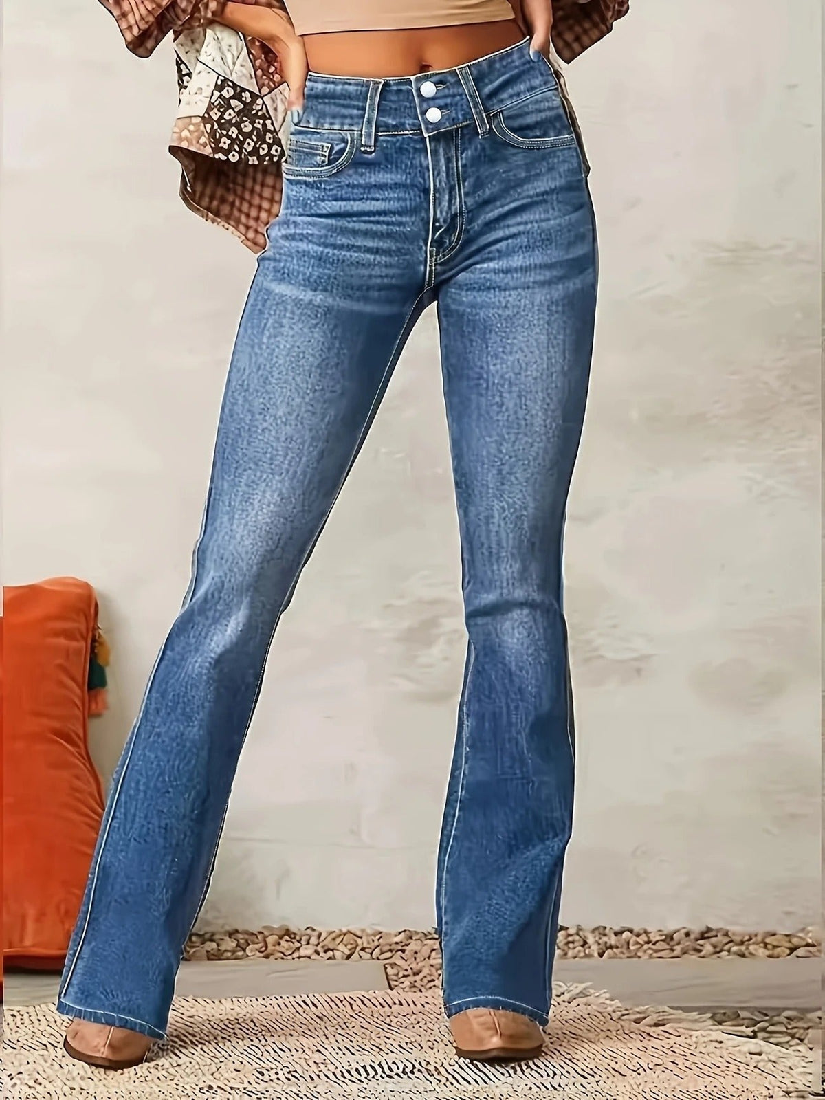 Damskie dżinsowe spodnie dzwony high waist dopasowane niebieskie