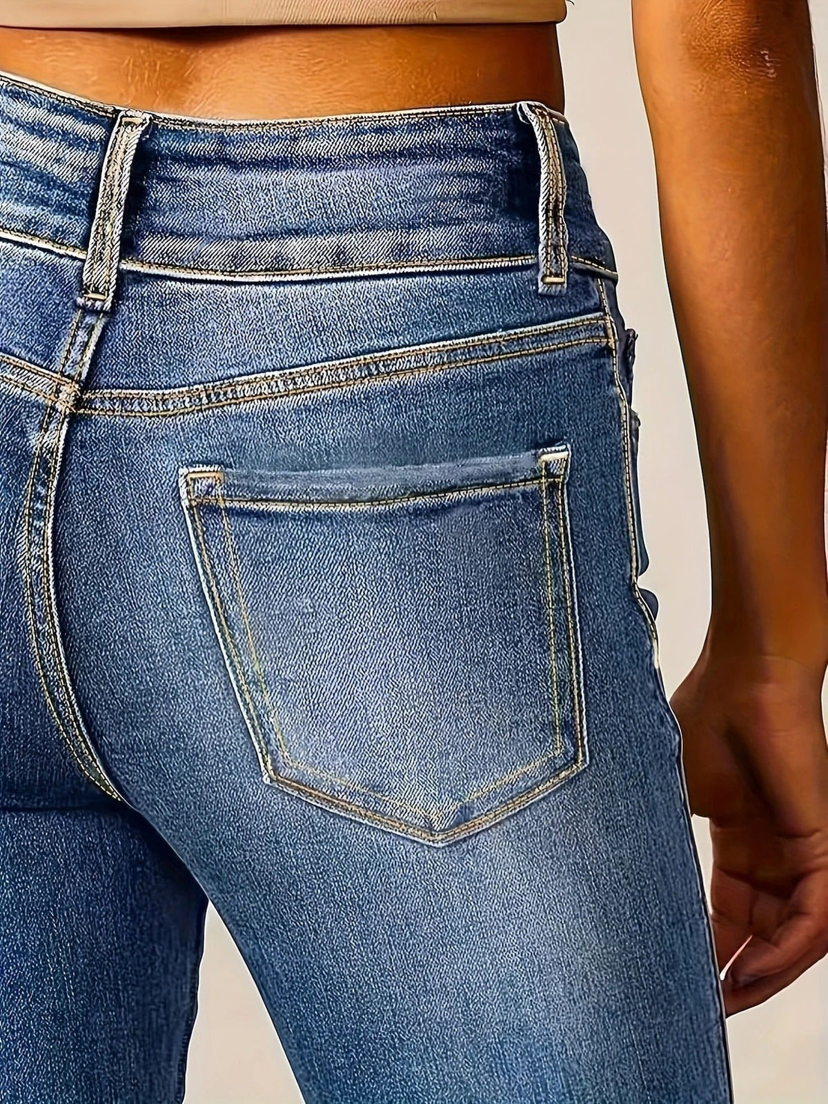 Damskie dżinsowe spodnie dzwony high waist dopasowane niebieskie