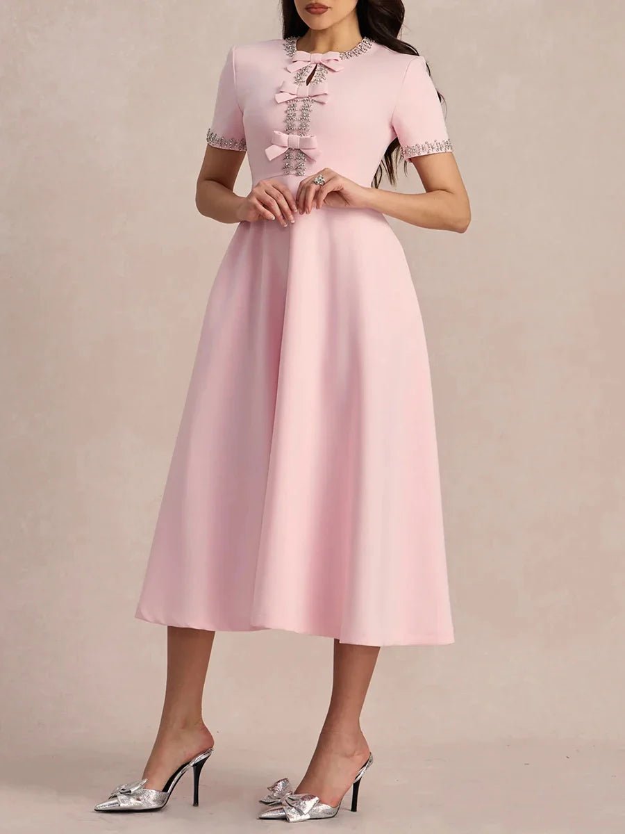 Elegancka sukienka midi z kokardkami i zdobieniem przy dekolcie - vivano - warszawa